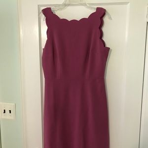 Laser cut a-line pink dress with scalloped trim.